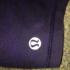 Dark purple LULULEMON shorts.